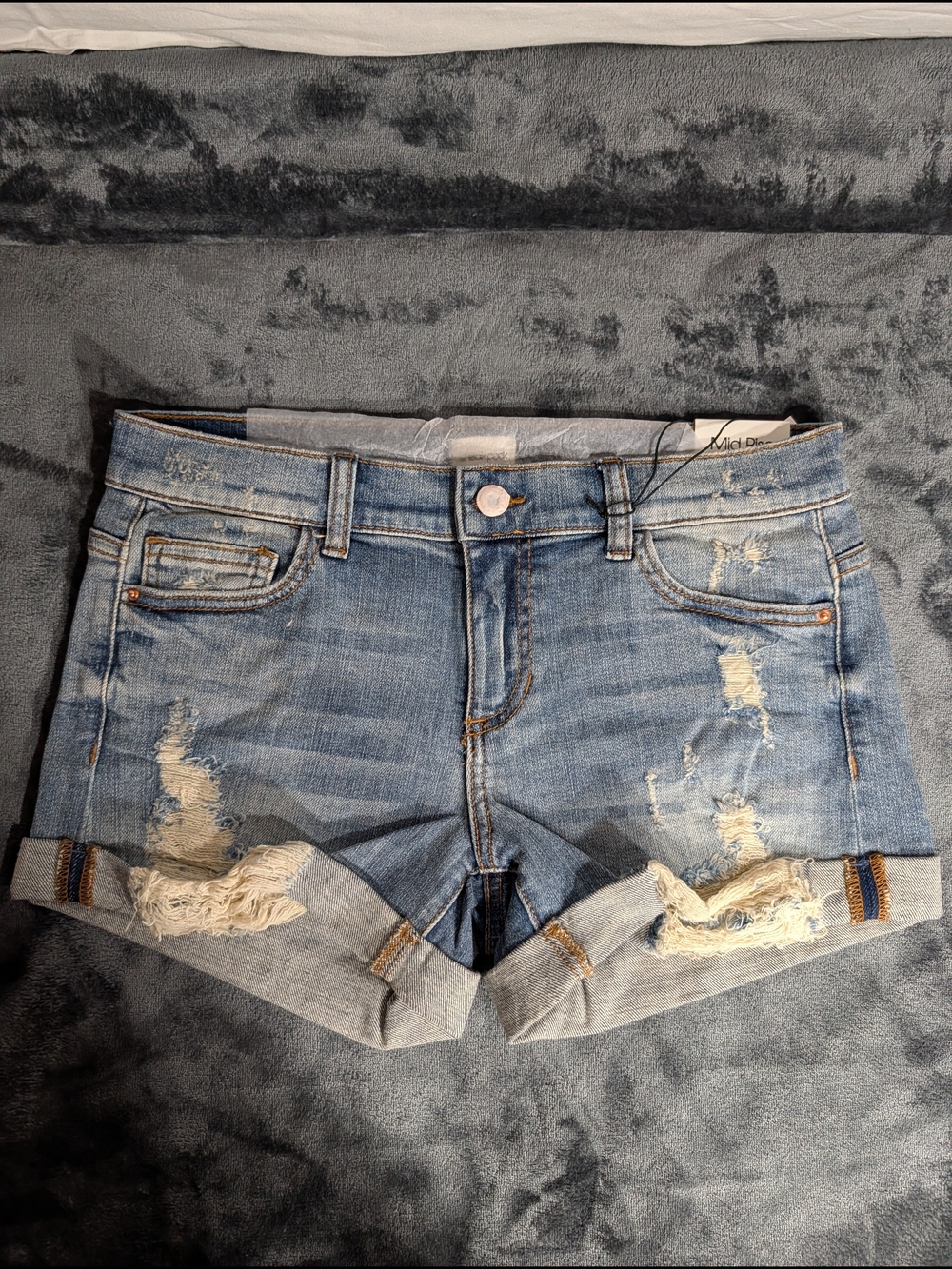 Light Blue Mid Rise Distressed Denim Roll-Cuff Jean Shorts